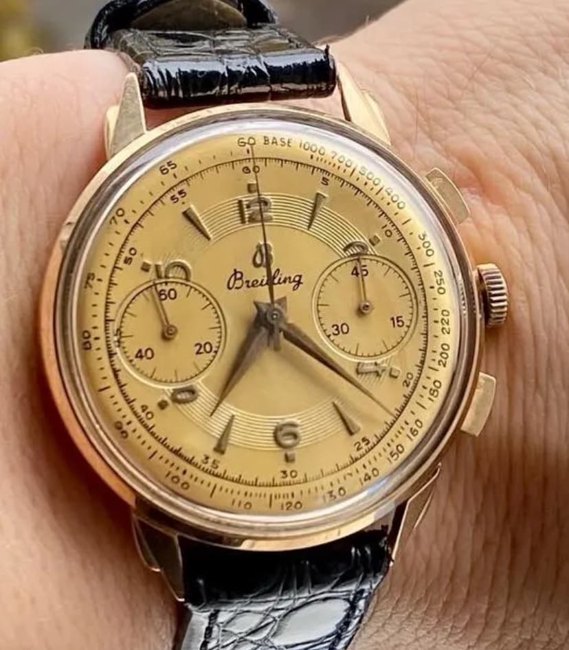 Estimation de l’authenticité et la valeur d’une montre Breitling des années 40-42 en or massif avec la référence 2003