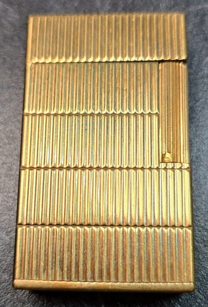 Estimation de la valeur d’un briquet Dupont en or 18 carats en très bon état et pesant 114 grammes