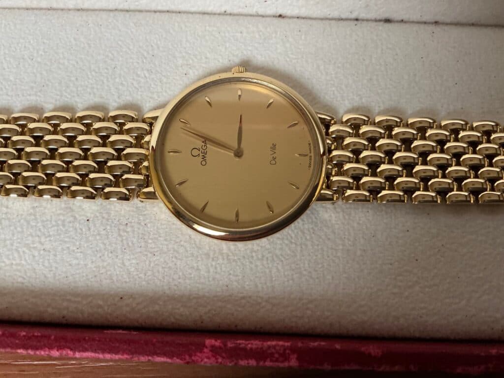 Estimation pour une Montre de Ville Omega en Or Jaune de 71,35g datant de l’année 2000 et en état Neuf