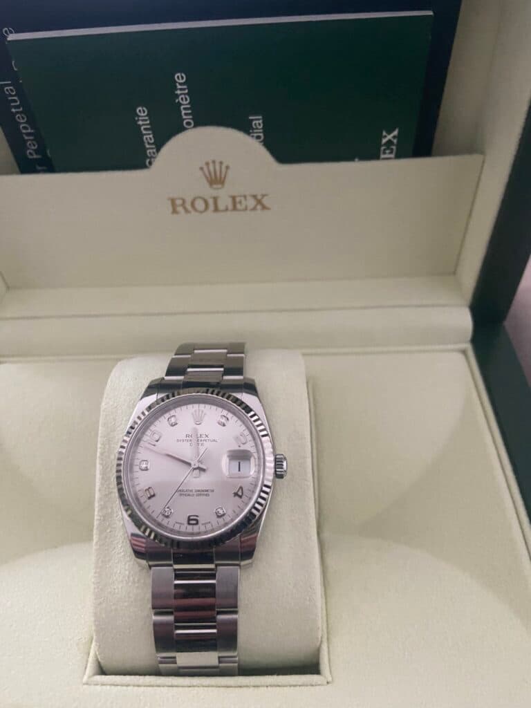 Estimation de la valeur de la montre Rolex Oyster Perpetual Date 36 en or blanc avec diamant intérieur, achat en 2012, en état neuf.