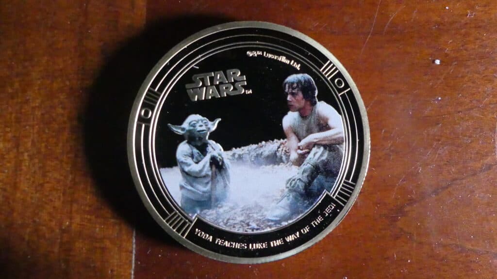 Estimation d’une collection de 13 pièces STAR WARS plaquée or Estimation d’une collection de 13 pièces STAR WARS plaquée or